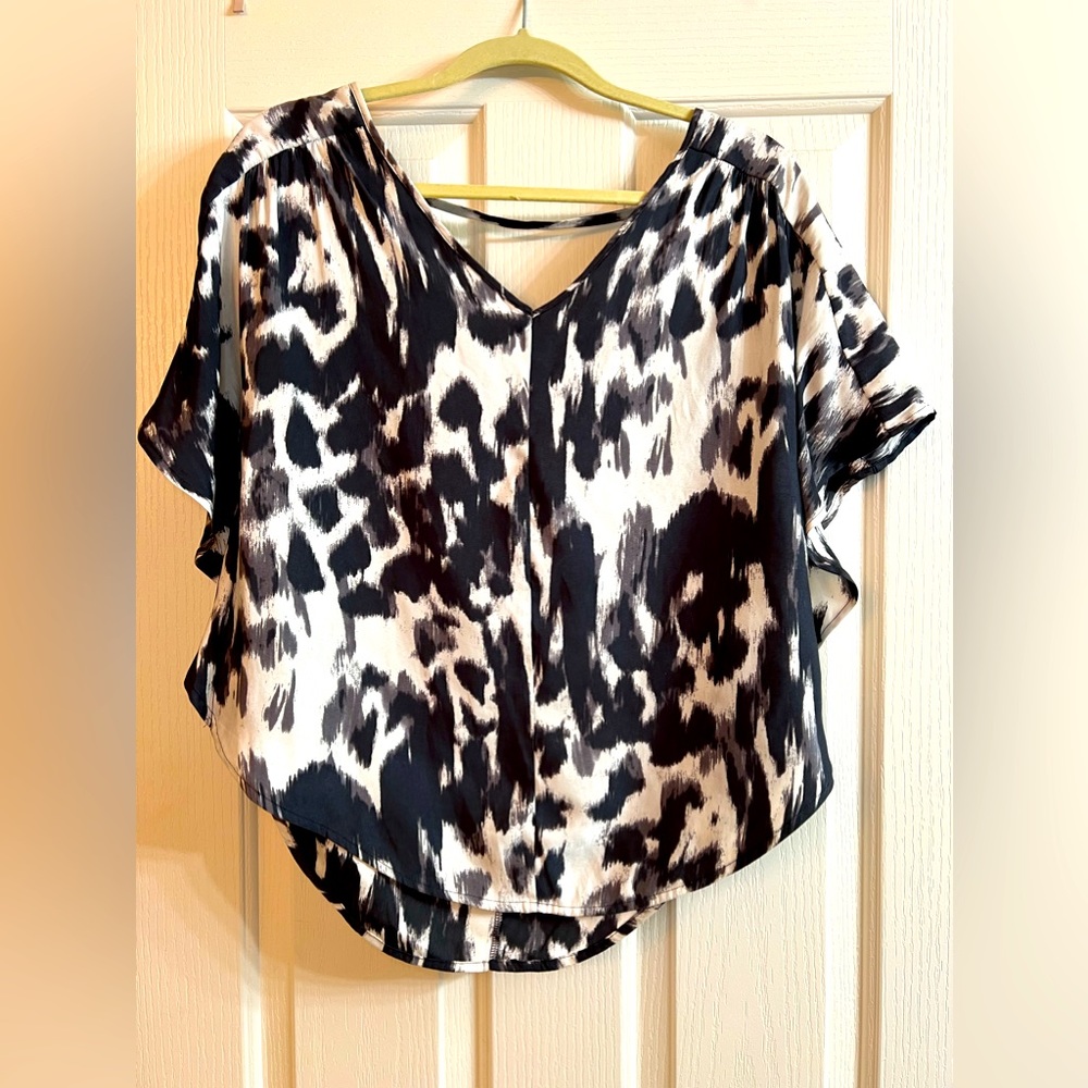 Express Woman’s Silk Leopard Print Batwing Blouse, Size Medium.